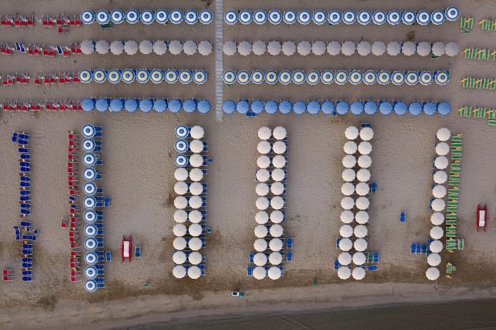 Aerial,View,Of,Beach,Umbrellas,Suitably,Aligned,For,An,Aesthetic