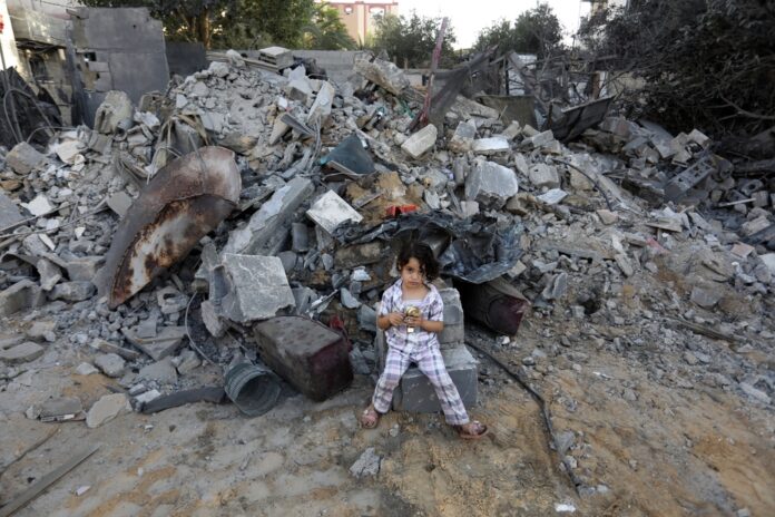 Palestinians,Inspect,Their,Destroyed,House,After,An,Israeli,Air,Strike,